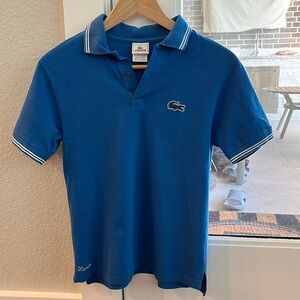 In great condition Authentic Lacoste Boys Blue Polo size 14